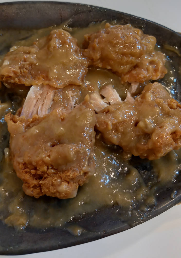Dissected Chicken Fillet shows meat that's cut in half. Lesser gravy but looks tasty.