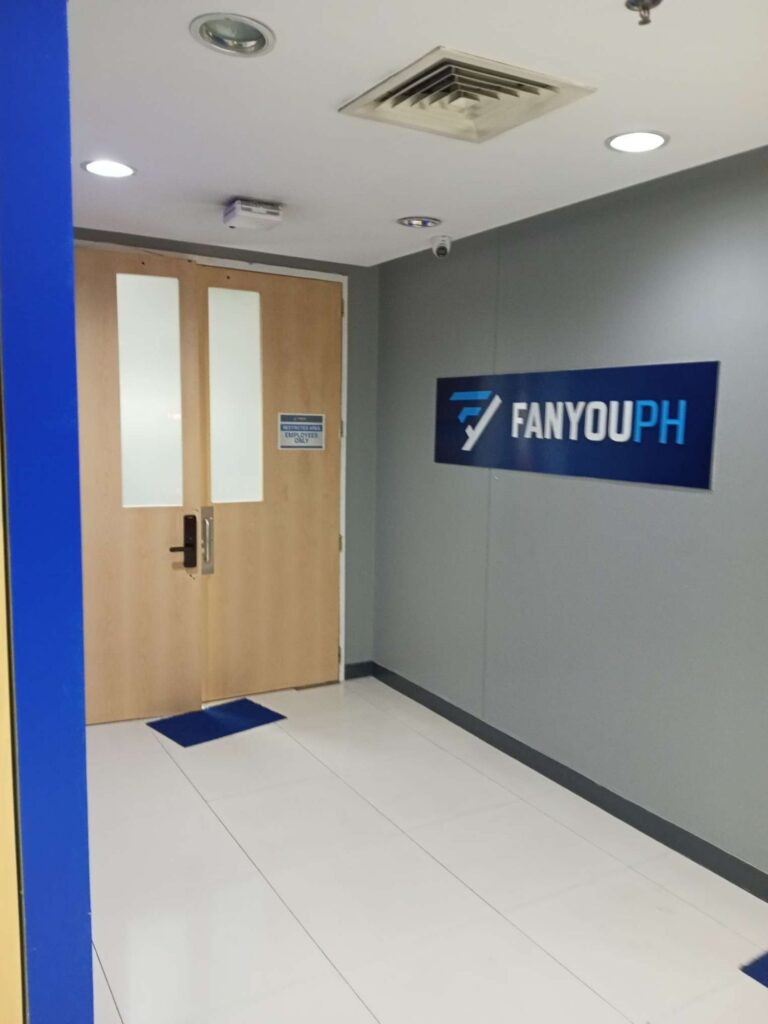 The entrance for Fanyou PH Employees in 8th floor i3 building at Cebu I.T. Park. The signage on the door says "Production Area. Employees Only.".
